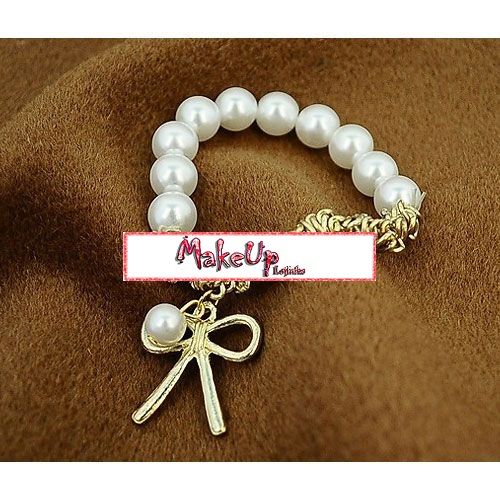 Pulseira pérolas e lacinho